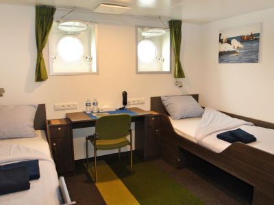 Beispiel einer Kabine Kat. B / Zweibett Bullaugenkabine (© Monica Salmang / Oceanwide Expeditions)